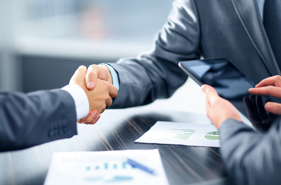 automotive executive search execs handshaking