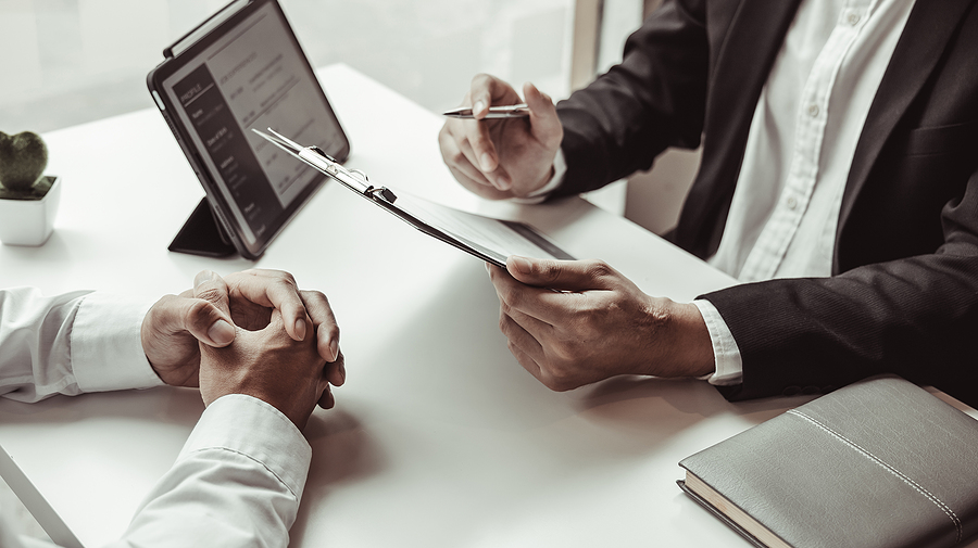 automotive executive search assessments at a table with executives
